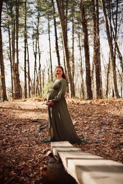 Standing tall on the boardwalk, gown draped to the boards