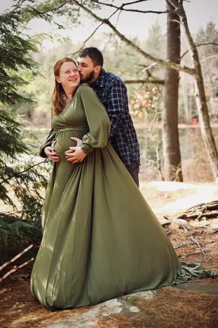 A kiss on the cheek by the water's edge